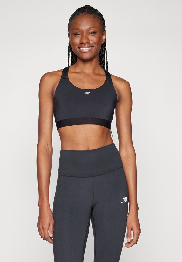 New Balance ESSENTIAL TRAIN BRA - Medium support sports bra - black