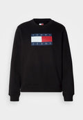 Schwarzer Sweatshirt mit Rundhalsausschnitt, mit einem rechteckigen Logo in Blau, Rot und Weiß, das "TOMMY JEANS" liest. Weicher Stoff, lässiger Schnitt.