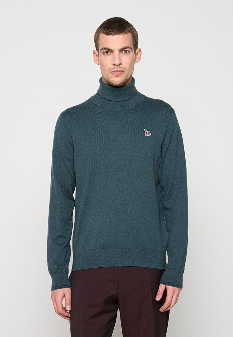 Dunkeltürkiser Rollkragenpullover in strukturiertem Strick, mit einem kleinen, auf der Brust gestickten Logo sowie gerippten Bündchen und Saum.