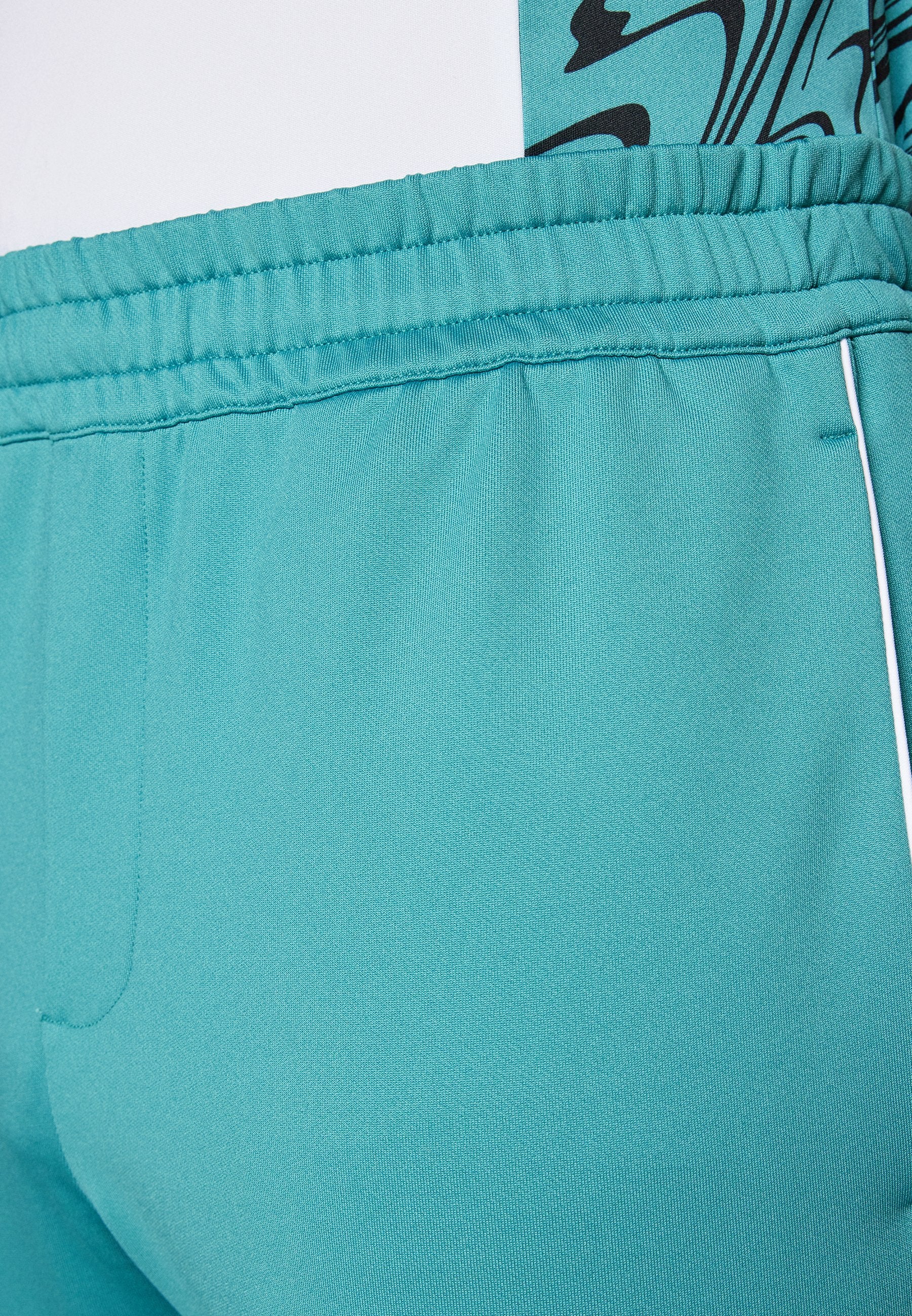 J.LINDEBERG Sports TRAVEN TRACK PANTS