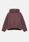 Unisex mauve Zip-up Hoodie mit langen Ärmeln, lockerem Schnitt und angenähter Kapuze, flach auf weißem Hintergrund dargestellt.