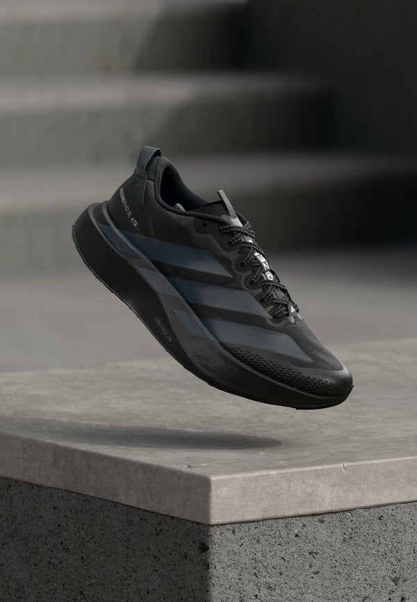 adidas Performance ADIZERO EVO SL ATR M - Road running shoes - core black/grey five/silver-coloured metallic