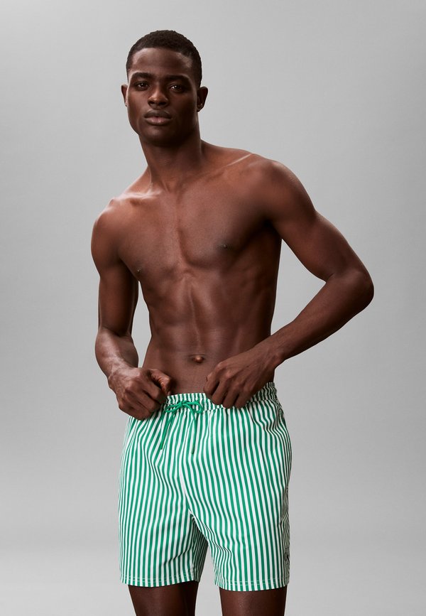 Calvin Klein Swimwear MEDIUM DRAWSTRING WAISTBAND - GRAPHIC MONOGRAM  - Swimming shorts - penny stripe+mardi gras green