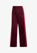adidas Originals FIREBIRD LOOSE - Tracksuit bottoms - maroon   power pink