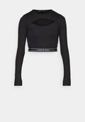 Schwarzes langärmliges Crop-Top mit einem Frontauschnitt und elastischem Saum, versehen mit weißem "Tommy Jeans" Branding und Logo.