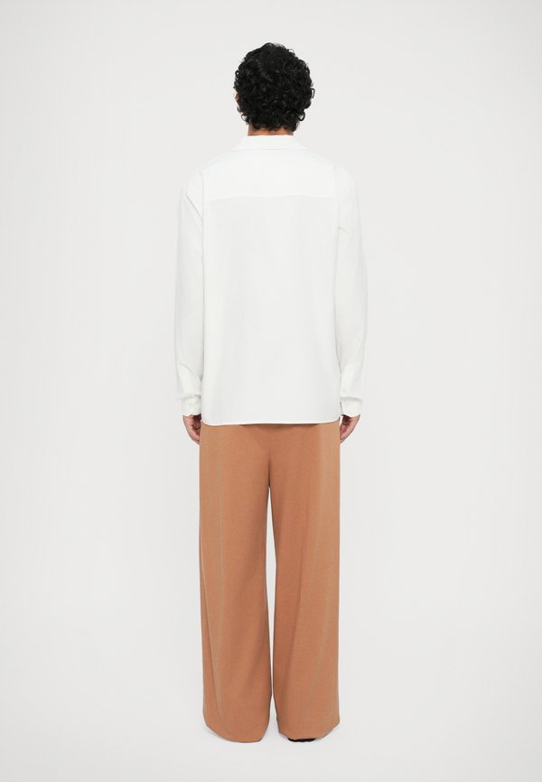 Essential Collective SHIRT