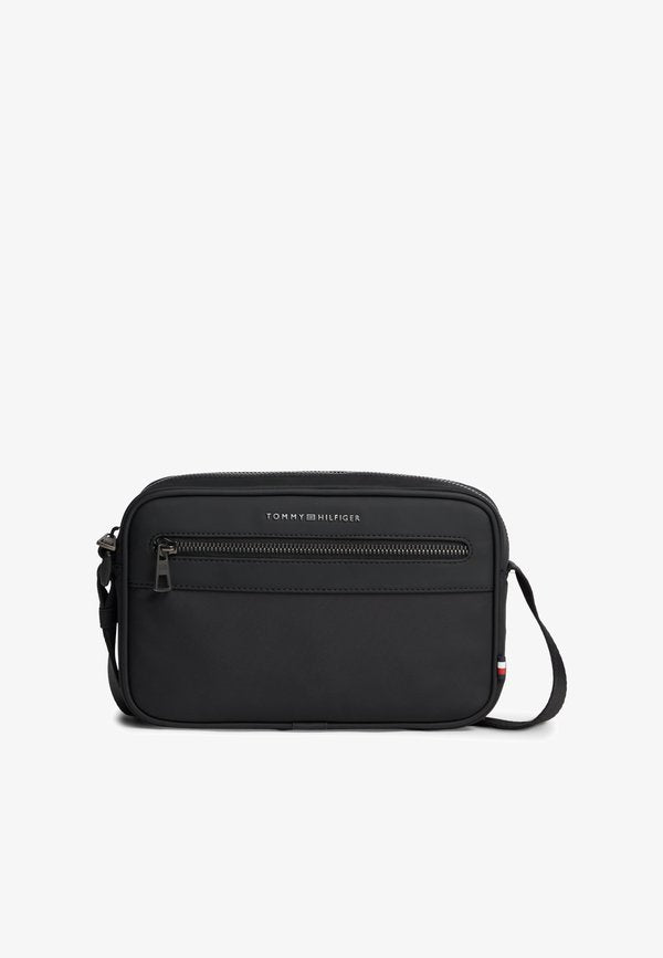 Tommy Hilfiger METAL LOGO CROSSBODY REPORTER BAG - Cross body bag - black