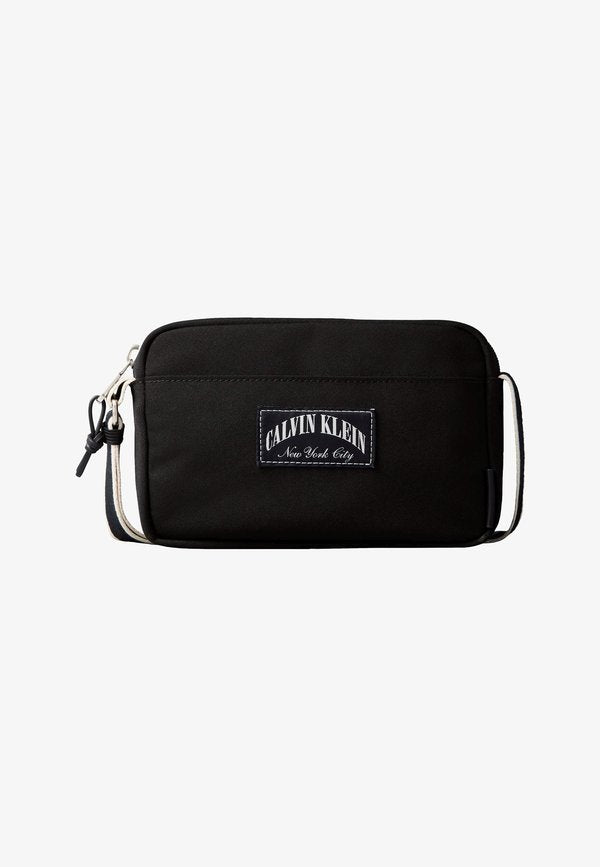 Calvin Klein CAPSULE - Cross body bag - black
