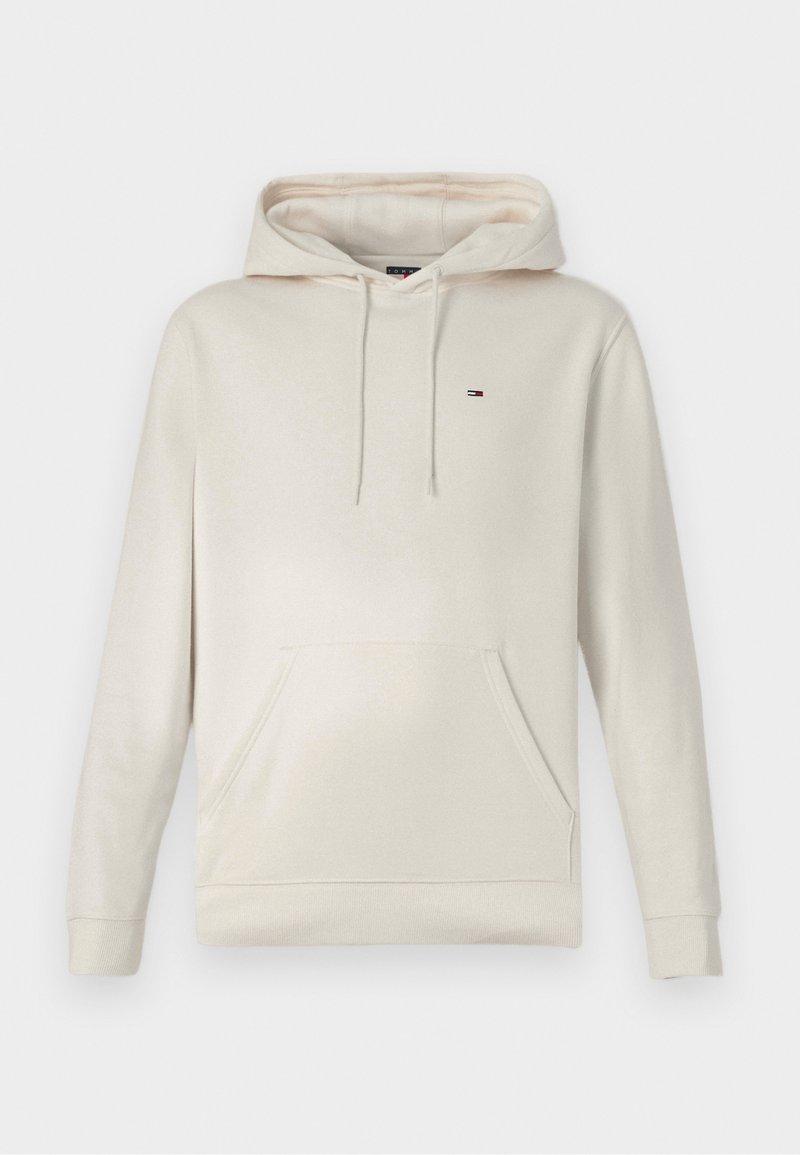 Hellbeiger Kapuzensweatshirt mit Fronttasche und Kordelzügen, mit kleinem rot-weiß-blauem rechteckigem Logo auf der Brust.