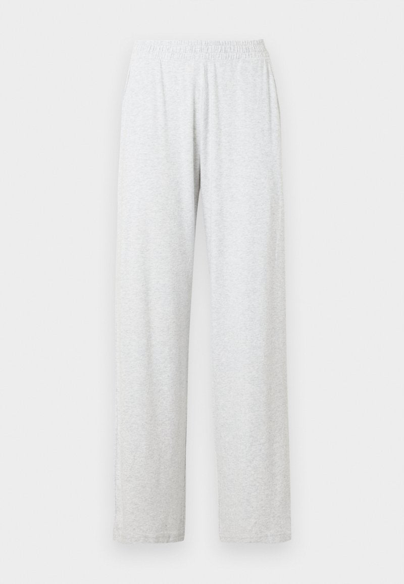 Hellgraue Baumwollmisch-Hose mit elastischem Bund und zwei Seitentaschen. Gerade geschnittenes Bein mit weichem, leicht strukturiertem Finish.