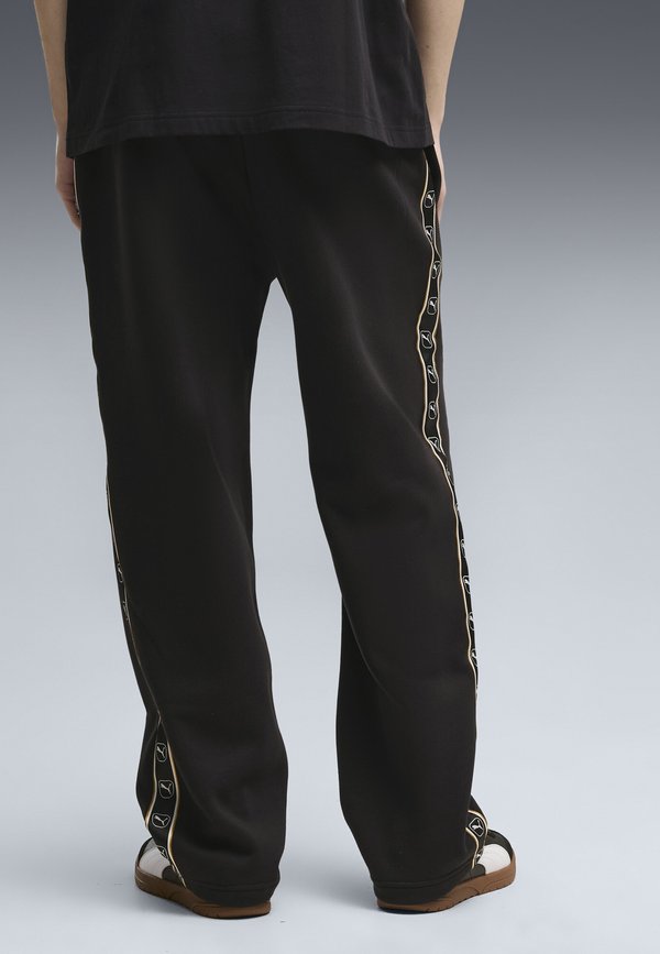 Puma ESSENTIALS ELEVATED TAPE RELAXED HOSE - Tracksuit bottoms - black