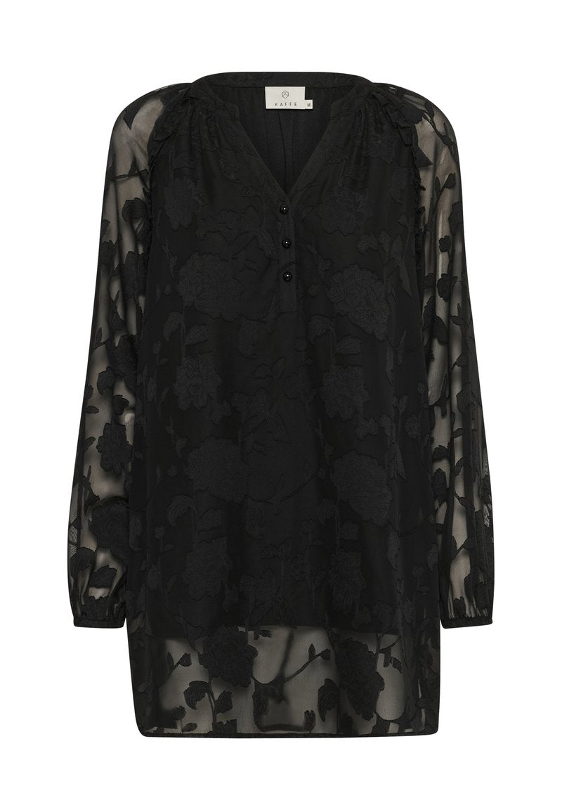 Schwarze transparente Bluse mit floralen Mustern, V-Ausschnitt, eine Drei-Knopf-Leiste und langen Ärmeln mit elastischen Bündchen. Glattes, leichtes Material.