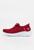 Roter gestrickter Sneaker mit weißer Sohle, Schnürung vorne, Skechers Slip-ins Branding und einem Strassherz-Detail an der Ferse.