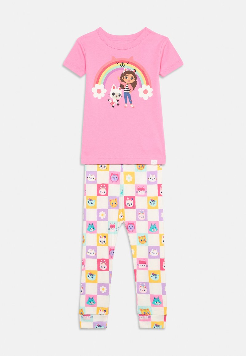 Rosa kurzärmeliges Shirt mit Mädchen und Katze unter einem Regenbogen, kombiniert mit karierten Leggings mit mehrfarbigen cartoonartigen Katzen- und Blumenmotiven.