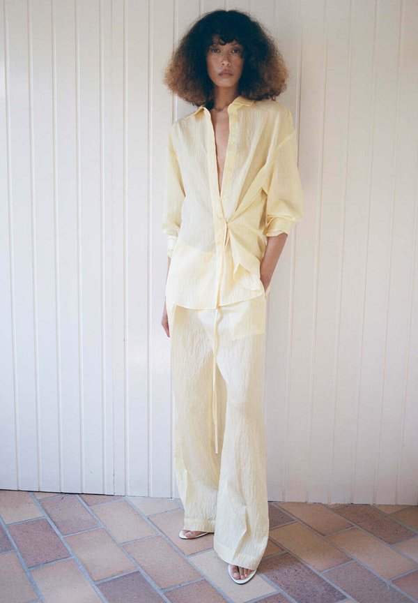Mango ADULT - Trousers - light yellow