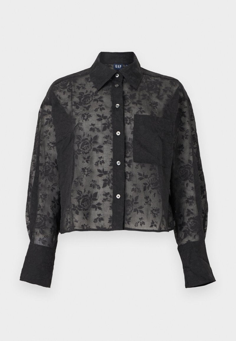 Schwarze, durchsichtige Bluse mit floralem Muster, langen Ärmeln, Knopfleiste, Kragen, Brusttasche und weit geschnittenen Manschetten.