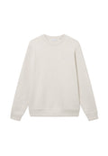 Hellgrauer Sweatshirt aus weichem Material. Verfügt über einen runden Halsausschnitt, lange Ärmel und gerippte Bündchen sowie einen Saum. Minimalistisches Design.