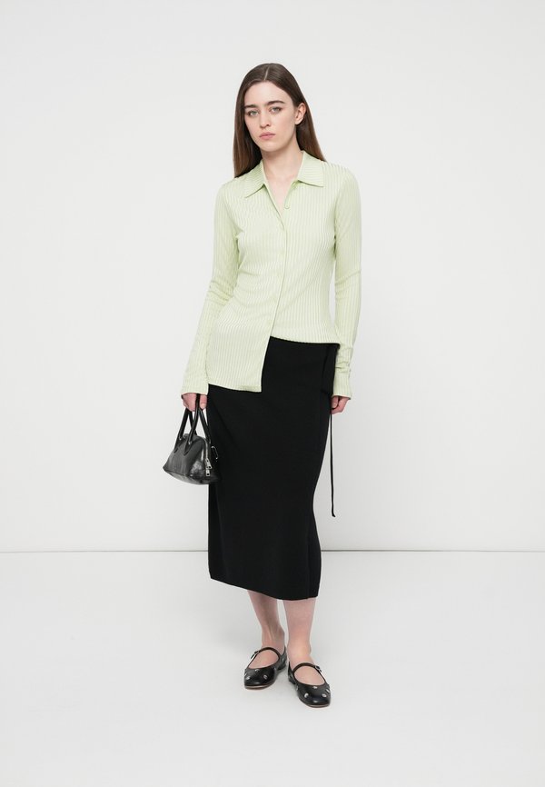CLOSED WRAP SKIRT