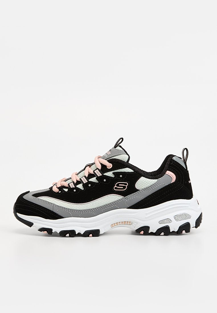 Kluftiger schwarzer, grauer und weißer Sneaker mit pinken Schnürsenkeln und Akzenten, mit dicker Sohle und Skechers-Logo an der Seite.