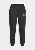 Puma SWEATPANTS - Tracksuit bottoms - black/metallic gold-coloured