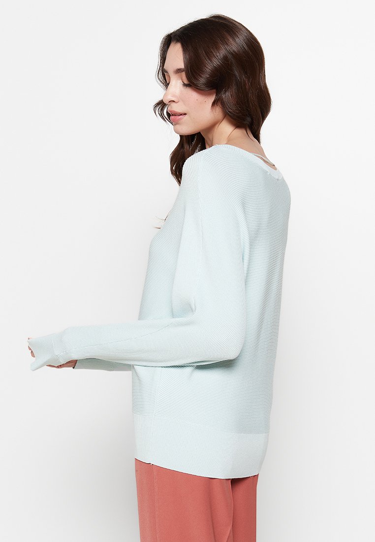 comma Strickpullover Media 2