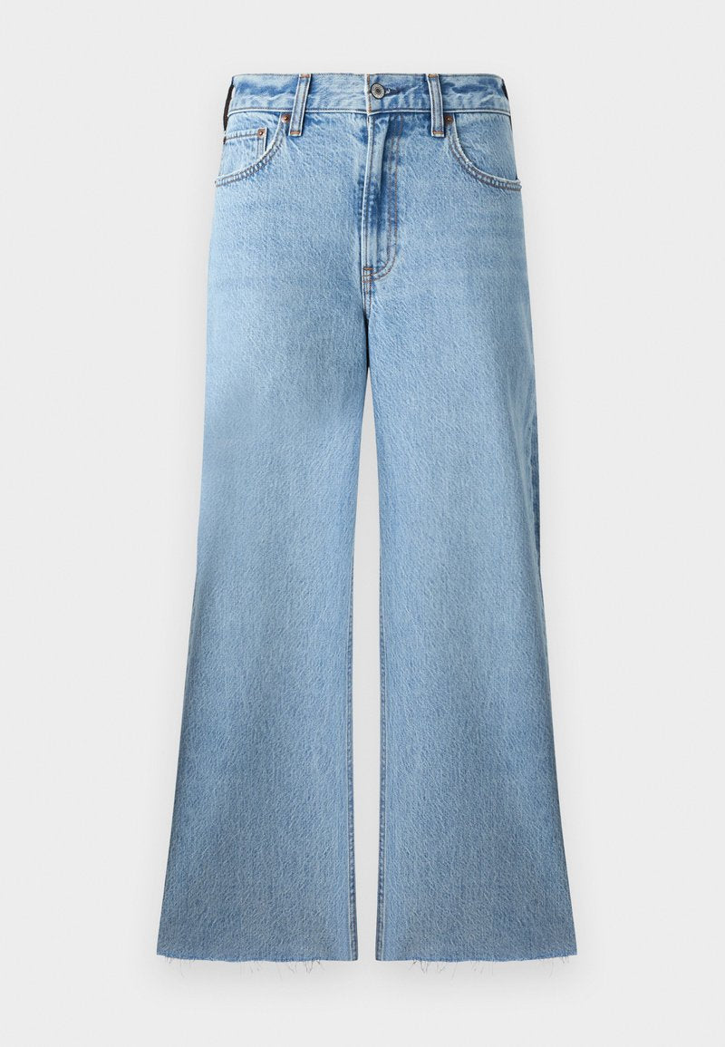 Helle blaue, weit geschnittene Jeans aus Denim mit strukturiertem Finish. Mit einer mittelhohen Taille und einem rohen Saumdetail.