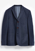 Blaues Fischgrät-Blazer mit zwei vorderen Taschen, braunen Knöpfen und floral gemustertem Futter. Maßgeschneidertes Design mit Revers.