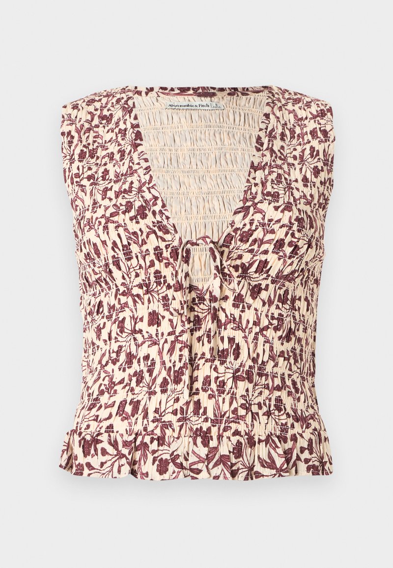 Ärmellose Bluse mit Blumenmuster, V-Ausschnitt, gerafftem Detail und Bindeband vorne; mit cremefarbenem Grundton und burgunderroten Akzenten.