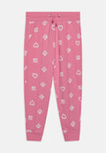 Rosa Sweatpants mit weißem Text und Herzmustern. Mit einem Kordelzugbund und seitlichen Taschen. Hergestellt aus weichem, bequemen Material.