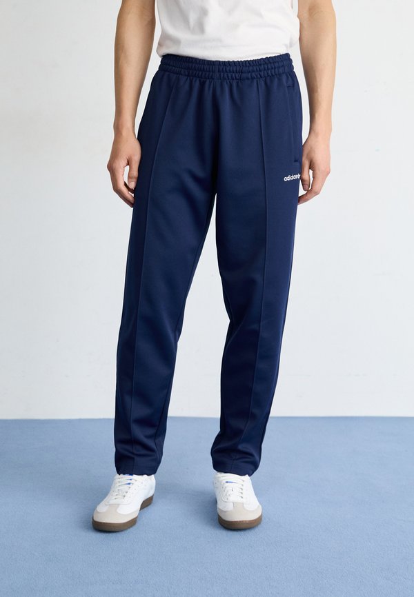 adidas Originals FIRST - Tracksuit bottoms - night indigo