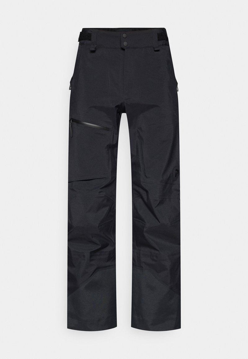 Schwarze wasserdichte Hose mit lockerem Schnitt, elastischem Bund, seitlichen Reißverschlusstaschen und strukturierter, strapazierfähiger Stoffqualität.