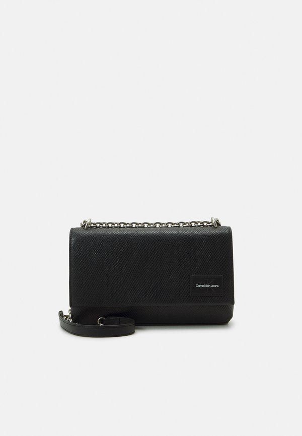 Calvin Klein Jeans SCULPTED FLAP SNAKE - Cross body bag - black