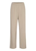 Beige Hose mit elastischem Bund und lockerem Schnitt; aus weichem, leichtem Stoff; mit geradem Bein-Design und ohne sichtbare Muster.