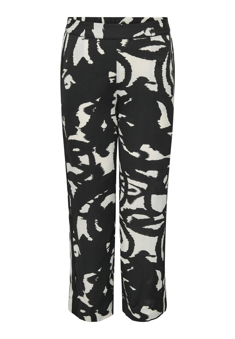 Schwarz-weiße gemusterte Weitbein-Hosen mit einem elastischen Bund, die abstrakte Formen und einen glatten, leichten Stoff aufweisen.