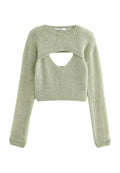 Hellgrüner, kurz geschnittener Pullover mit langen Ärmeln, der an der Vorderseite einen großen Ausschnitt und eine gerippte Textur aufweist. Weicher Stoff mit lockerer Passform.
