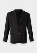 Dunkelgrauer Blazer aus glattem, strukturiertem Stoff. Mit Reverskragen, zwei vorderen Knöpfen und einer einzelnen Tasche auf der linken Seite.
