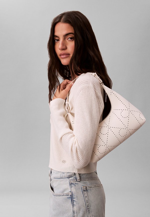 Calvin Klein EMBLEM PERFOR BAG - Handbag - white alyssum