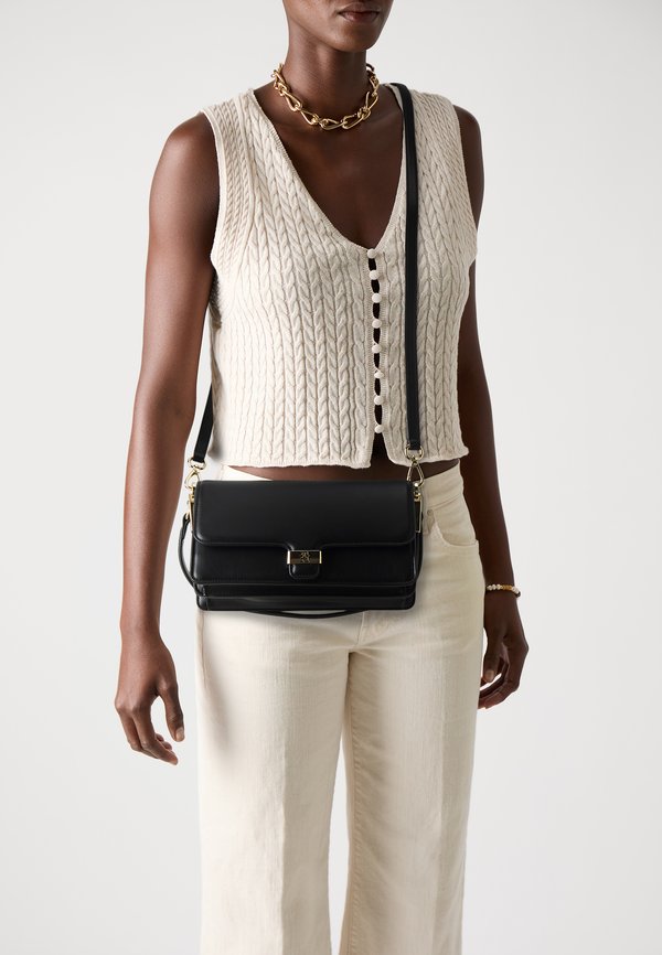 Tommy Hilfiger TH HERITAGE CROSSOVER - Cross body bag - black