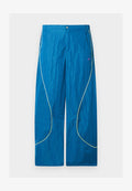 Nike Sportswear TOBI - Tracksuit bottoms - brilliant blue/voltage green/dark raisin/vivid purple