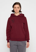 Burgunderfarbene Kapuzenpullover mit einer vorderen Kängurutasche, gerippten Bündchen und einem bedruckten Grafik, die "Women of the Wave" sagt.