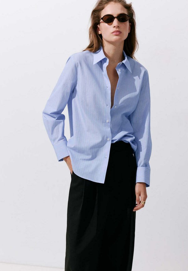 Mango ADULT - Button-down blouse - light blue