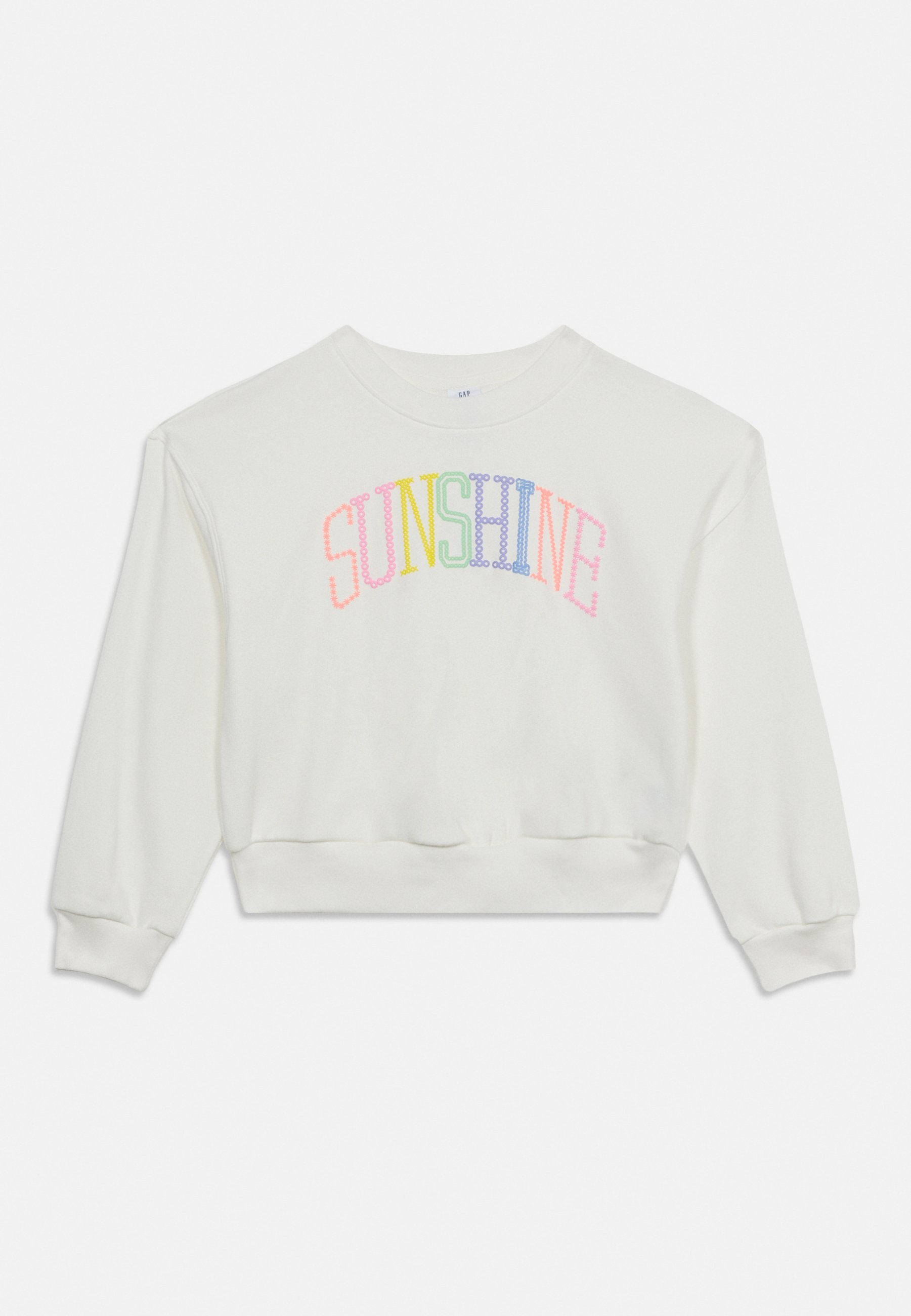 Weißes Sweatshirt mit langen Ärmeln, gerippten Bündchen und dem Schriftzug "SUNSHINE" in mehrfarbigen, gepunkteten Buchstaben auf der Brust.