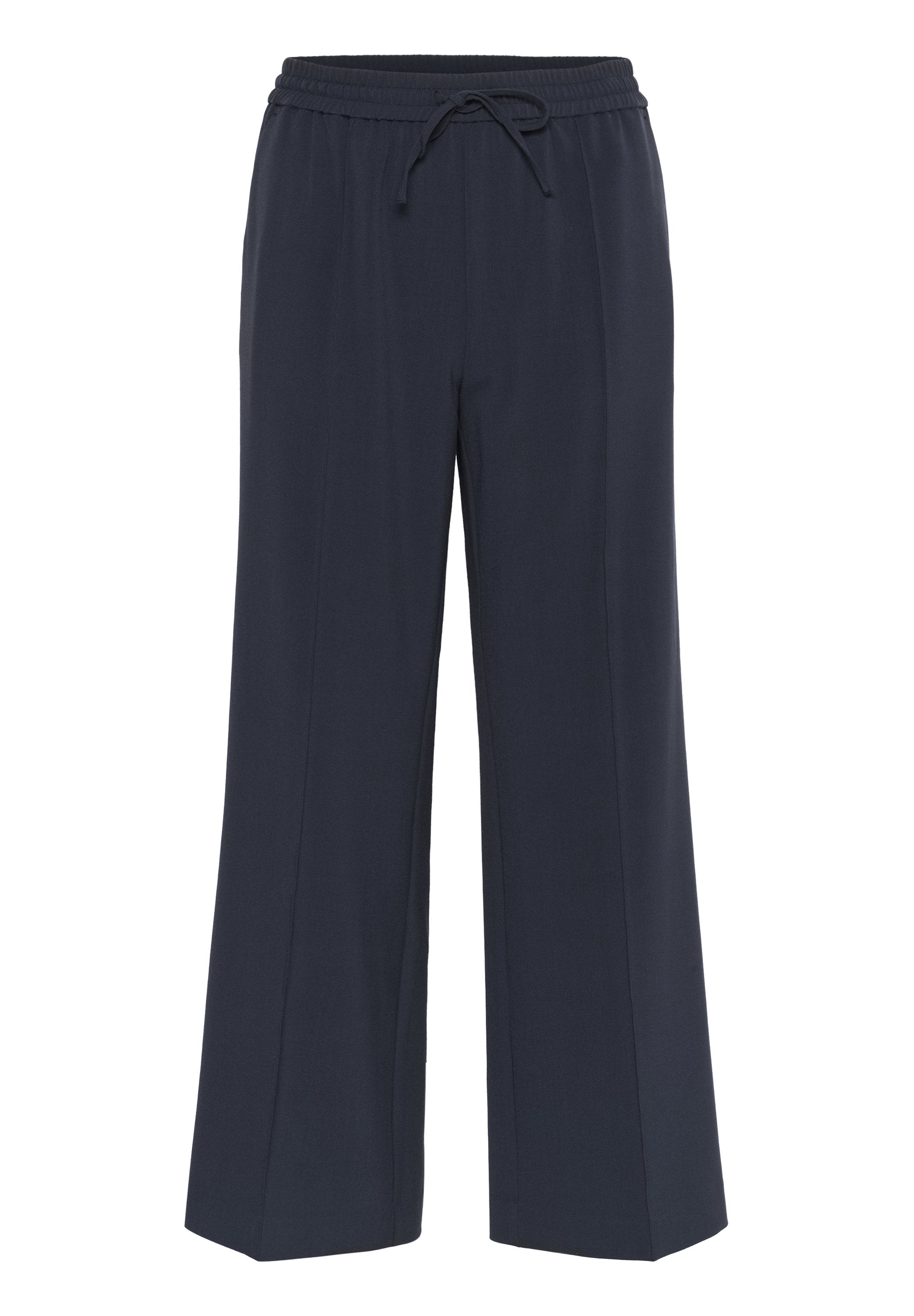 Navy Schlaghosen mit elastischem Bund und Kordelzug. Glatte Textur, ohne Muster, mit geraden Seitennähten und bequemer Passform.