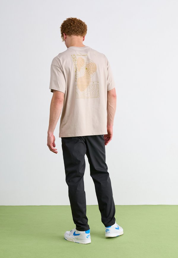 New Balance ATHLETICS STANDARD TAPERED PANT 30"