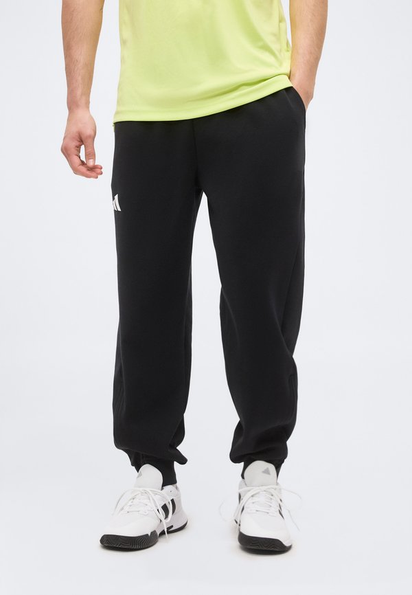 adidas Performance COVER UP PANTS - Tracksuit bottoms - black