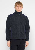 Dunkelgraue Fleecejacke mit hohem Kragen, Reißverschluss und marineblauen Schulterakzenten. Verfügt über seitliche Taschen und eine strukturierte Oberfläche.