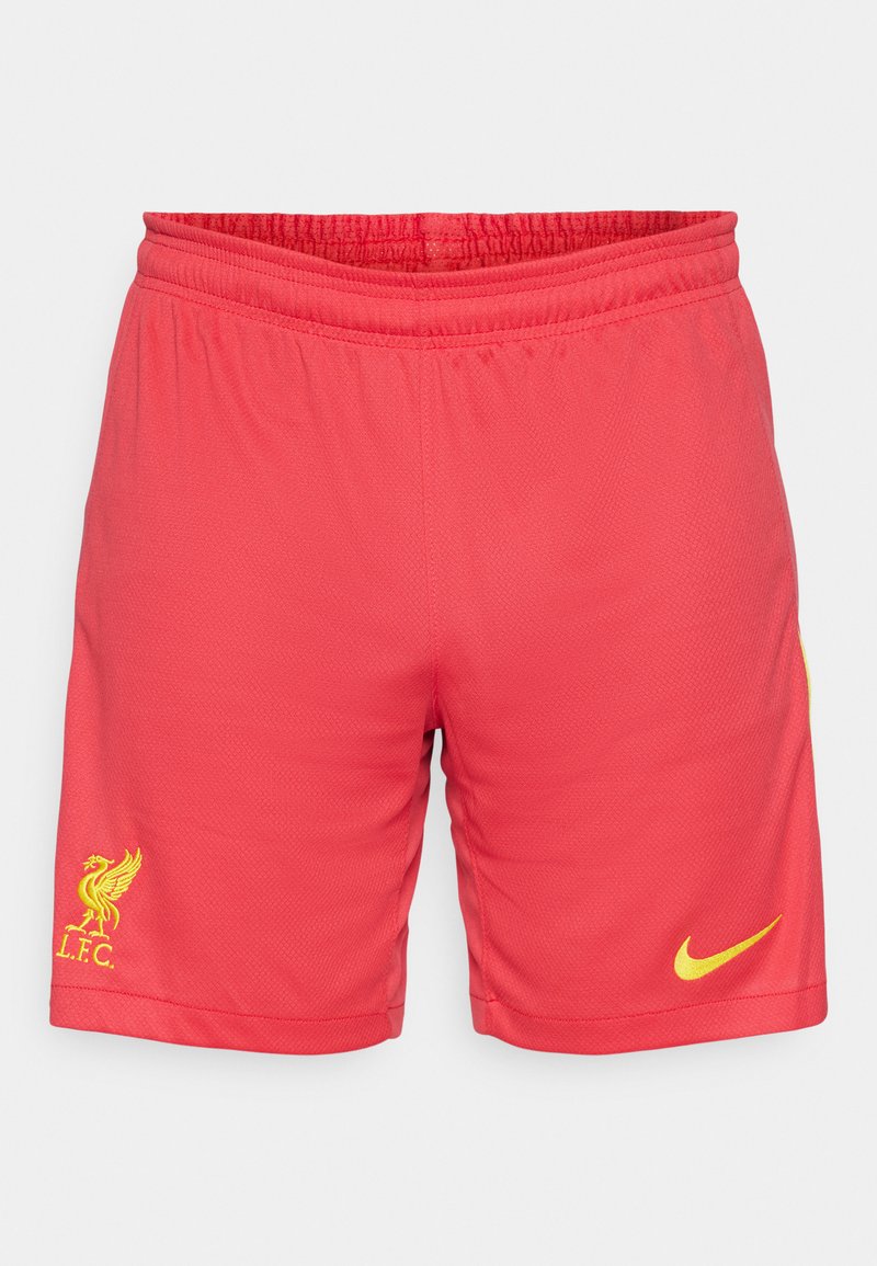 Rote Sportshorts aus atmungsaktivem Stoff; mit gelbem Liverpool FC-Logo und Nike-Swoosh; elastischer Bund; glatte Oberfläche.