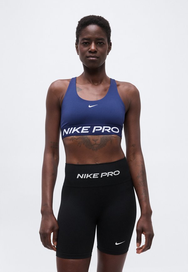 Nike Performance 365 BRA - Medium support sports bra - midnight navy/white