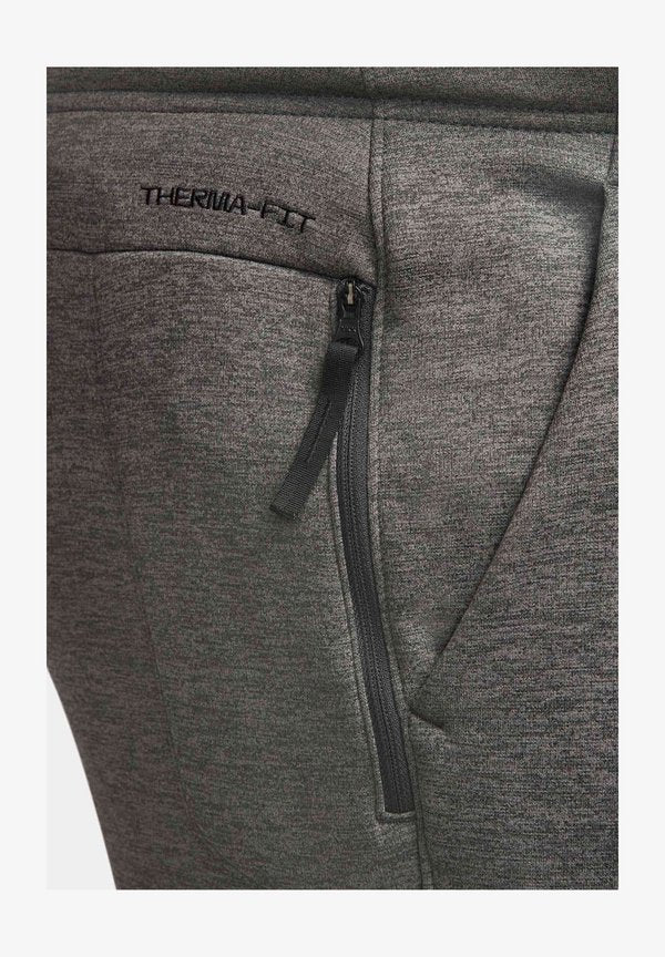 Nike Performance M NK TF REGULAR - Tracksuit bottoms - charcoal heather dark smoke grey black