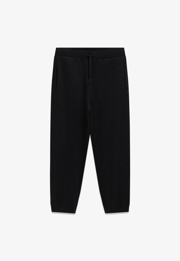 Guess JOGGINGHOSE MIT SEITLICHEM LOGO - Tracksuit bottoms - schwarz